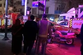 التماس مادر و پسر یکی از آتش نشانان حاضر در خیابان بهار + عکس