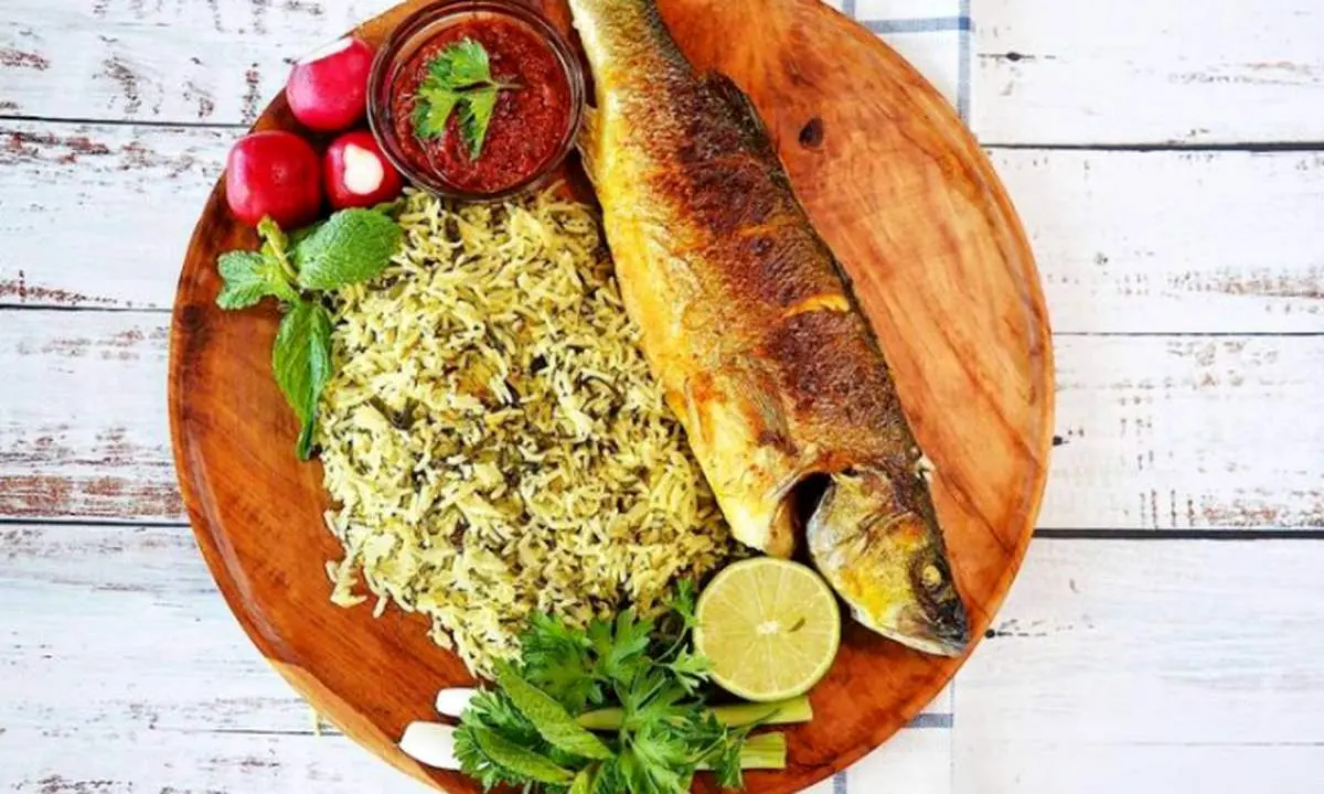 آیا می دانید چرا غذای شب عید «سبزی پلو با ماهی» است؟/ طرز تهیهیک ماهی پلوی بسیار خوشمزه