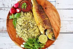 آیا می دانید چرا غذای شب عید «سبزی پلو با ماهی» است؟/ طرز تهیهیک ماهی پلوی بسیار خوشمزه