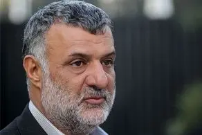 عکس‌های لو رفته از وزیر سابق کشاورزی با لباس خاکی+ببینید  