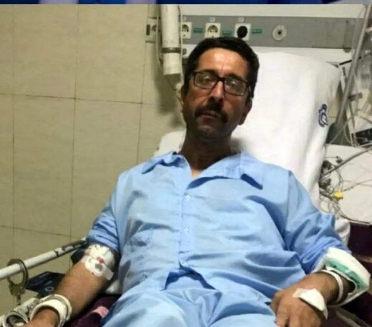واکنش دادگستری به جنجال عکسی از حمید قرهحسنلو با دستبند در بیمارستان