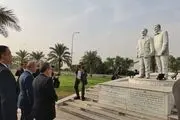 ادای احترام عراقچی به شهیدان سردار سلیمانی و ابومهدی المهندس
