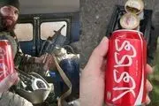 واکنش به عکس کوکاکولای ایرانی در دست نظامیان روسی+ ببینید 