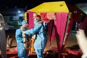 عروسی عجیب و متفاوت برای یک زوج کرونایی!+عکس