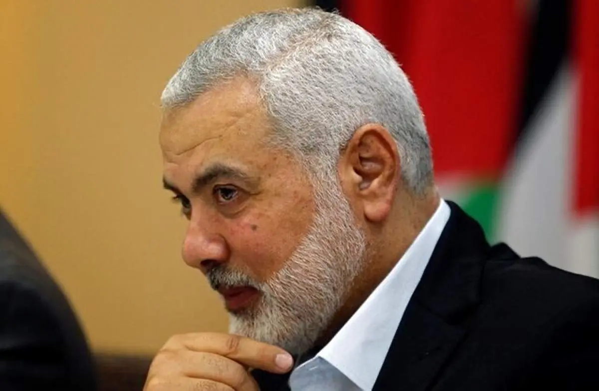 عکسی از بوسه اسماعیل هنیه بر سر همسرش
