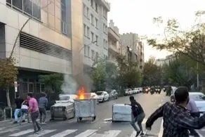 سرنوشت دختری که بدون روسری روی ماشین پلیس رفت| در زنجان چه خبر است