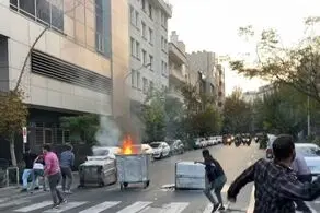 سرنوشت دختری که بدون روسری روی ماشین پلیس رفت| در زنجان چه خبر است