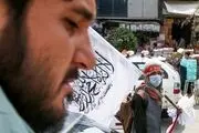 تصویر این زن در کنار طالبان جنجالی شد+ببینید 